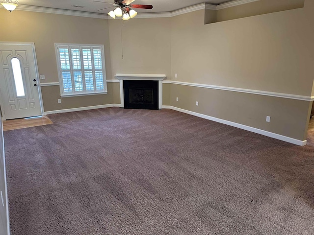 unfurnished living room with ceiling fan, crown molding, and carpet