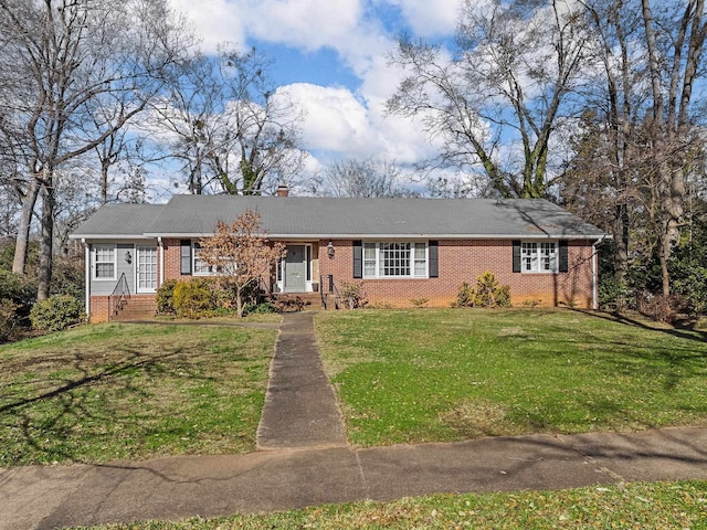 ranch-style home with a front yard