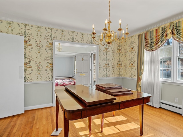 office area featuring light hardwood / wood-style floors, an inviting chandelier, ornamental molding, and a baseboard radiator