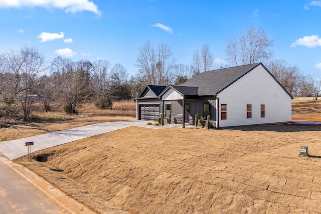 view of front of property with a garage