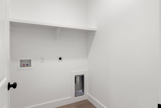 laundry area with hookup for a washing machine, hardwood / wood-style floors, and electric dryer hookup