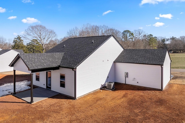 back of house featuring a patio and central air condition unit