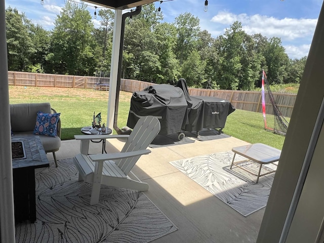 view of patio featuring a grill