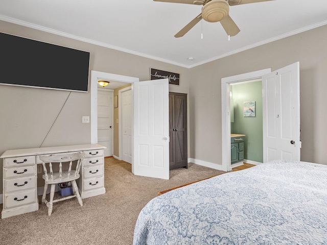 carpeted bedroom featuring ceiling fan, connected bathroom, and ornamental molding