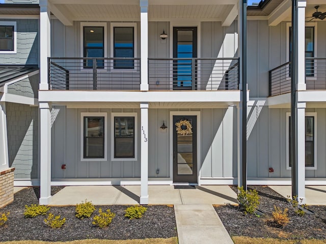 entrance to property with a balcony