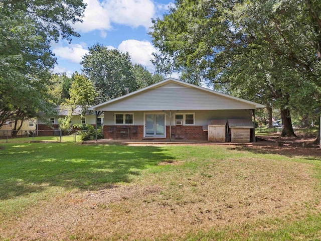 ranch-style home with a front yard