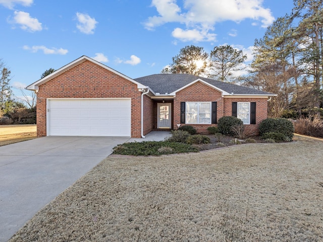 single story home featuring a front yard and a garage