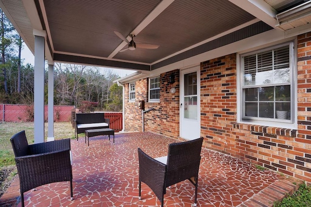 view of patio / terrace featuring ceiling fan and outdoor lounge area