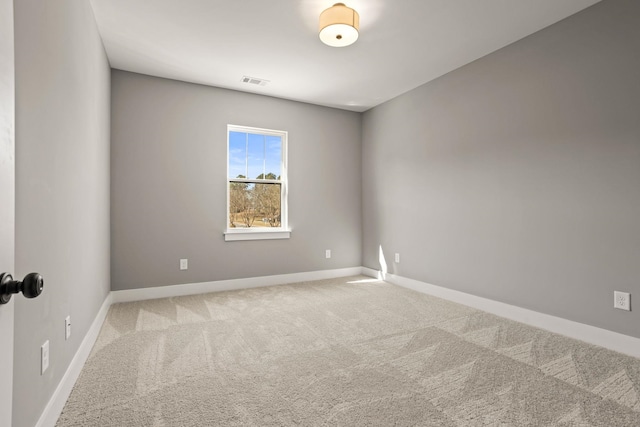 unfurnished room with carpet floors