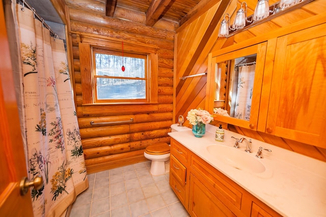 bathroom with toilet, rustic walls, wood ceiling, beamed ceiling, and vanity