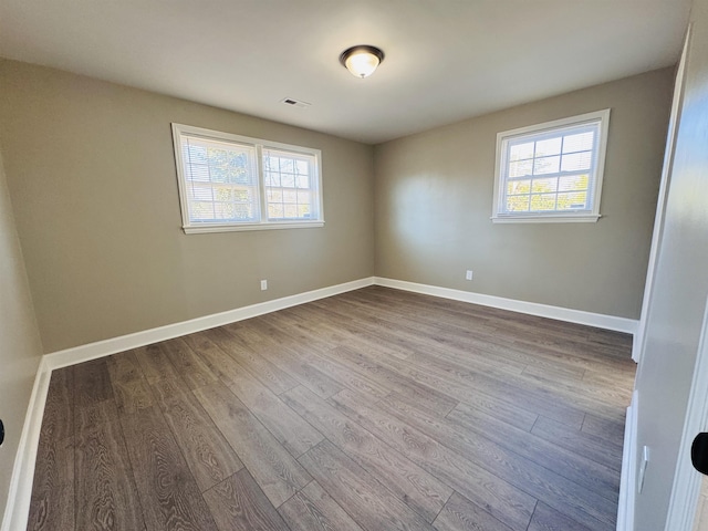 unfurnished room featuring light hardwood / wood-style flooring