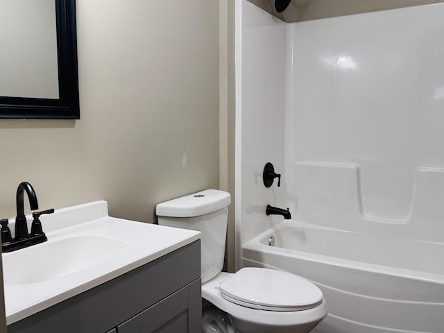 full bathroom with toilet, vanity, and shower / bath combination