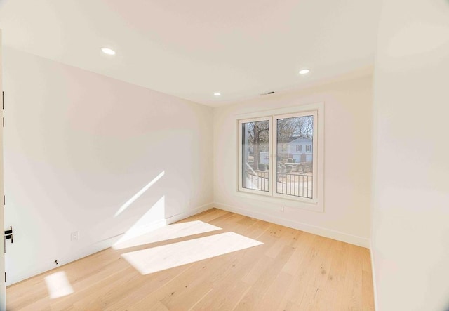 empty room featuring light hardwood / wood-style flooring