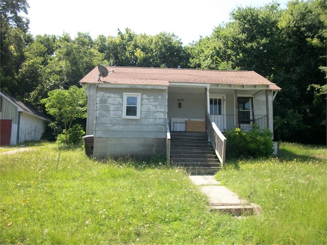 bungalow-style house featuring covered porch