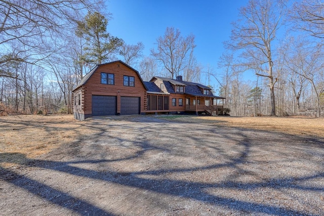 log cabin with a garage