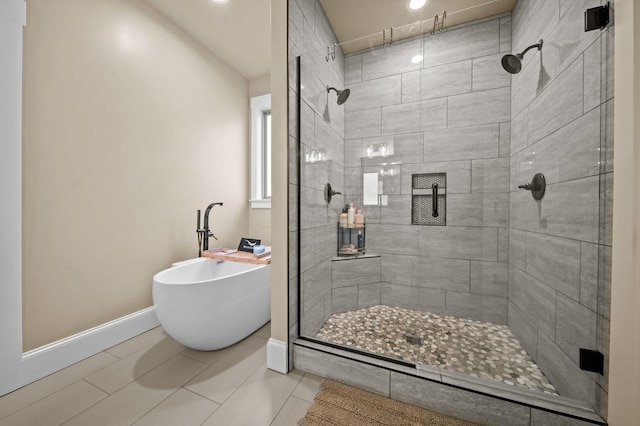 bathroom featuring tile patterned floors and plus walk in shower