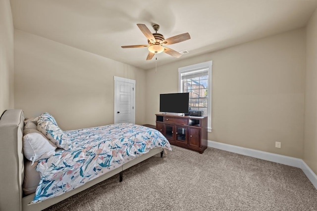 carpeted bedroom featuring ceiling fan