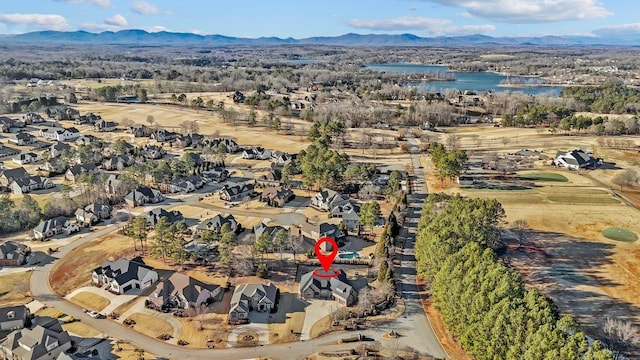 aerial view with a water and mountain view