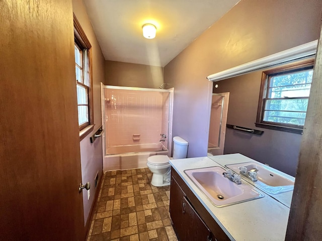 full bathroom featuring bathtub / shower combination, toilet, and vanity