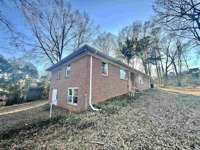 view of side of property with a garage