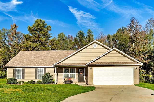 ranch-style home with a garage and a front lawn