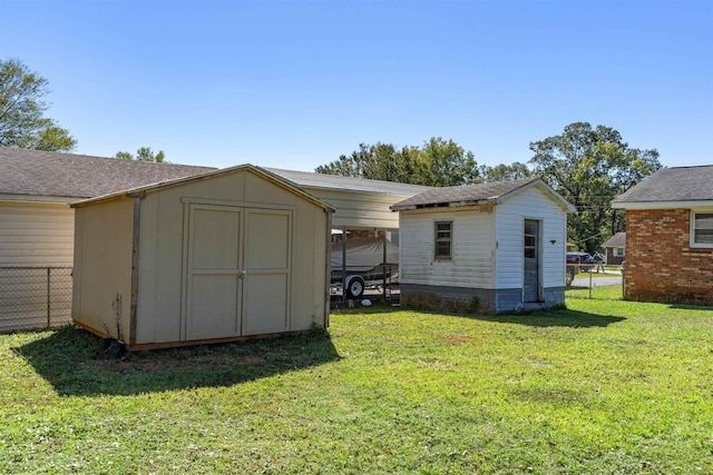 view of outbuilding with a yard