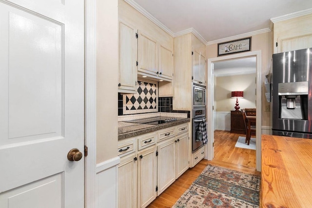 kitchen with light wood-type flooring, backsplash, stainless steel appliances, and ornamental molding