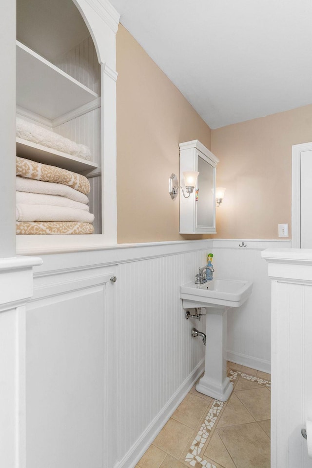 bathroom with sink and tile patterned floors