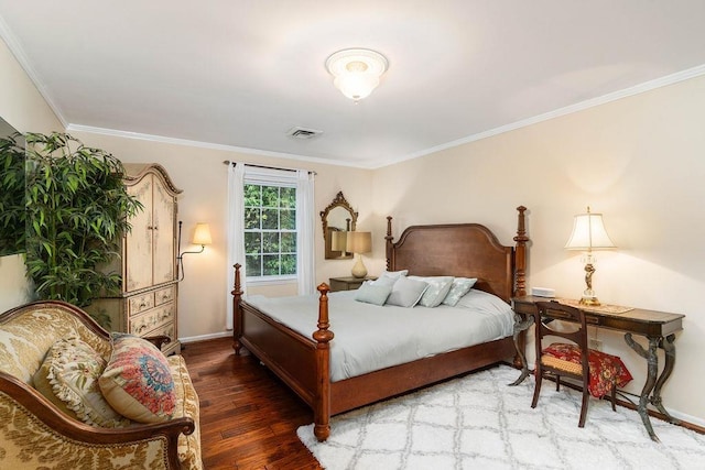 bedroom with wood-type flooring and ornamental molding