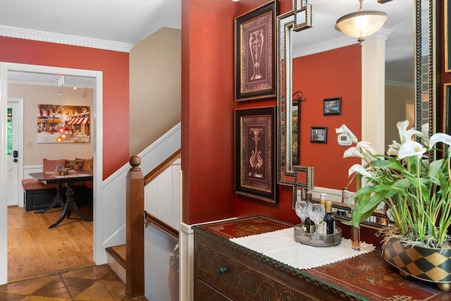 interior space with ornamental molding, tile patterned flooring, and decorative columns