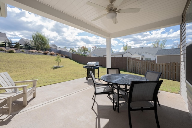 view of patio featuring ceiling fan and grilling area