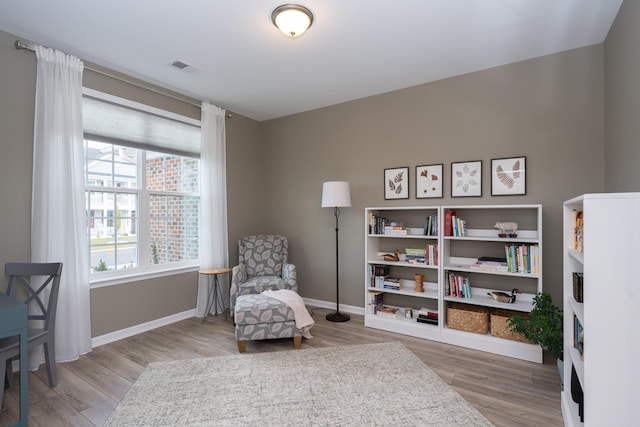 living area featuring light hardwood / wood-style flooring