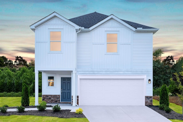 view of front of home with a garage