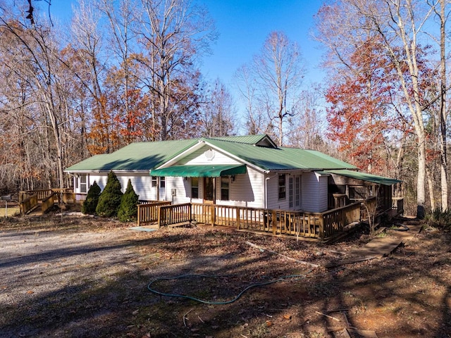 view of front of property with a deck