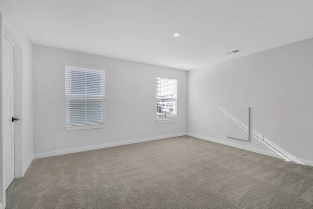 unfurnished room with carpet