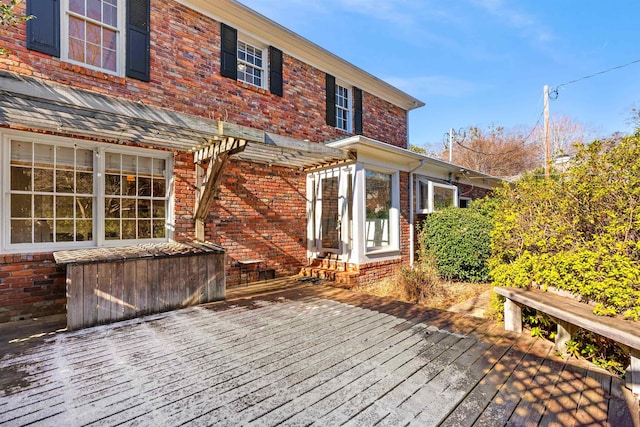 wooden terrace with a pergola