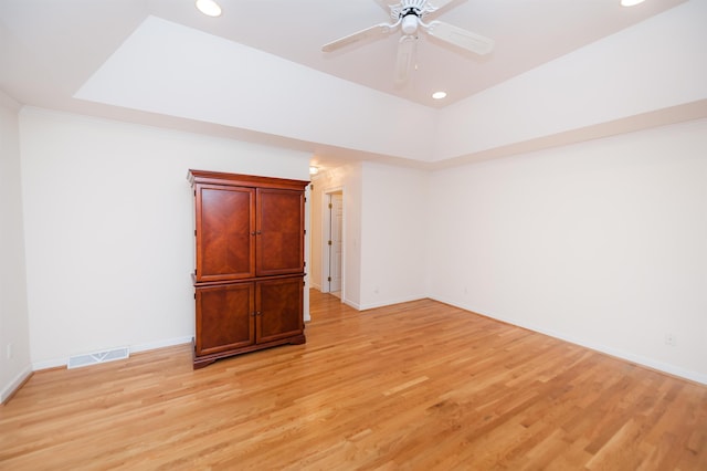 spare room featuring ceiling fan and light wood-type flooring