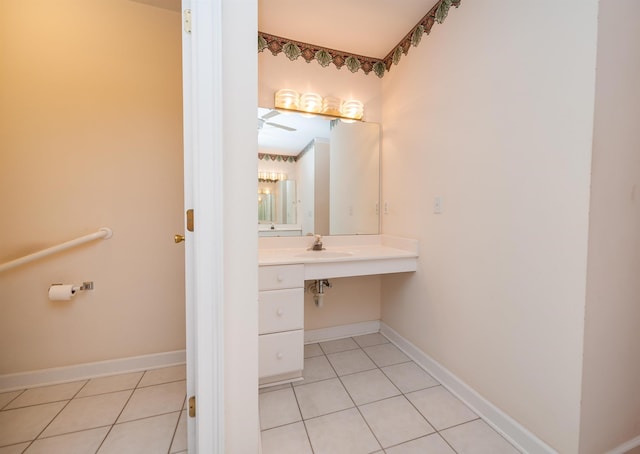 bathroom featuring tile patterned flooring and sink