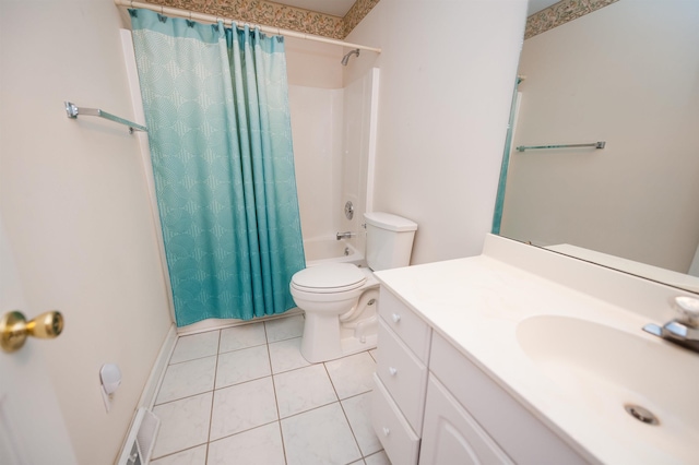 full bathroom featuring toilet, shower / bath combo, vanity, and tile patterned floors