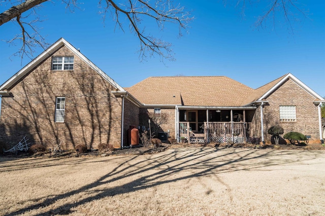 back of house with covered porch