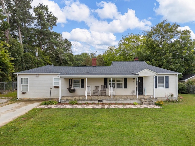 single story home with a front lawn and a porch