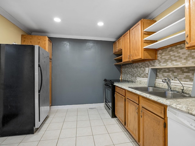 kitchen featuring decorative backsplash, dishwasher, stainless steel refrigerator, black electric range oven, and sink