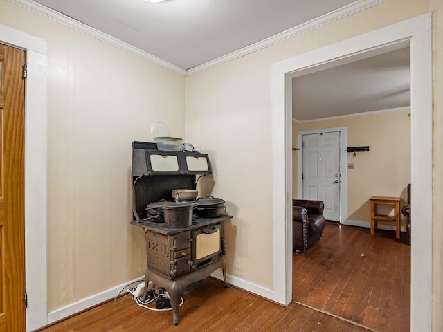 interior space featuring wood-type flooring and crown molding