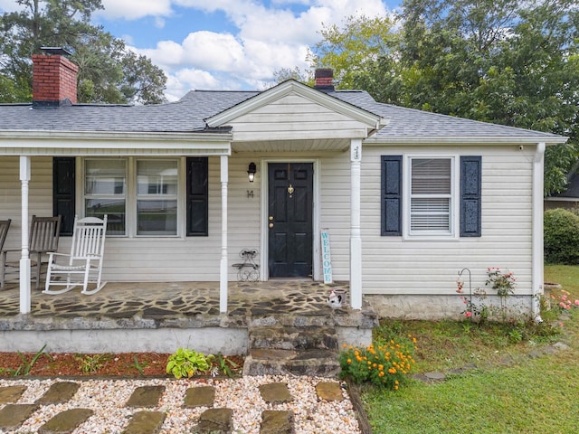 bungalow-style home featuring covered porch