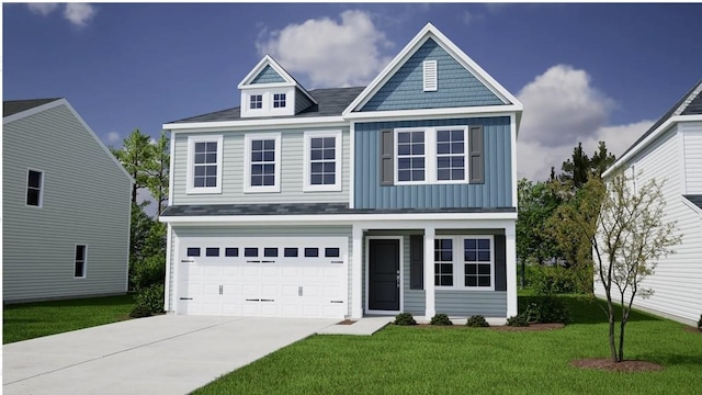 view of front of house with a front yard and a garage