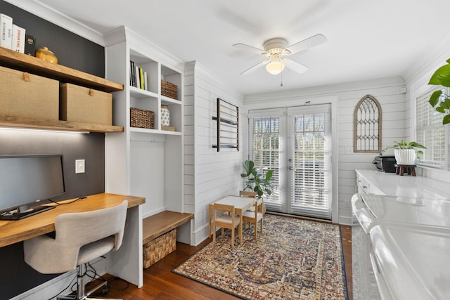 office area featuring ceiling fan, wooden walls, dark wood-type flooring, ornamental molding, and french doors