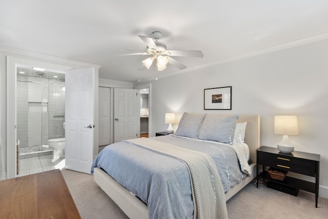 bedroom featuring ceiling fan, crown molding, and connected bathroom