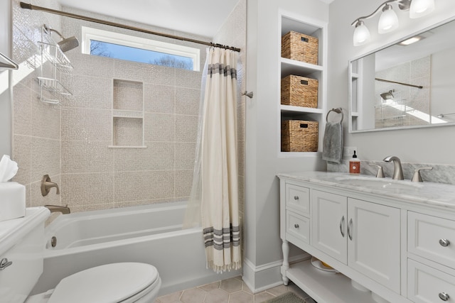 full bathroom featuring toilet, vanity, tile patterned flooring, and shower / bathtub combination with curtain