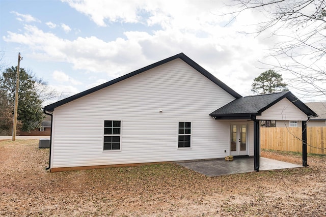 back of house with a patio area, central air condition unit, and french doors