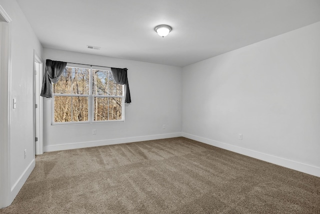 empty room with carpet floors